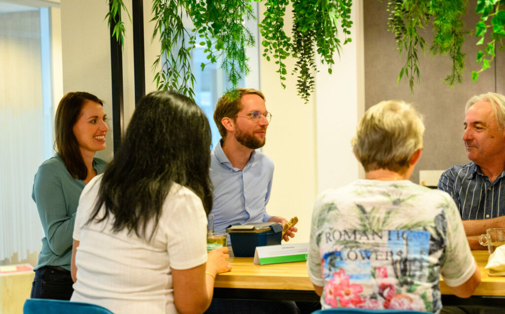 Collega's aan de lunchtafel bij Stimulansz