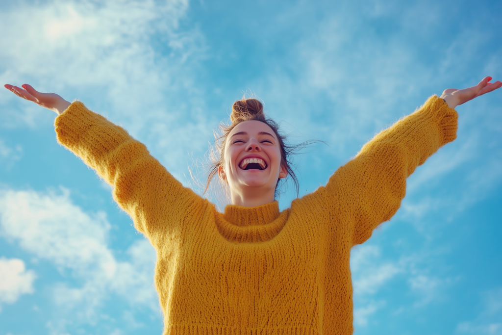 Vrouw met handen in de lucht